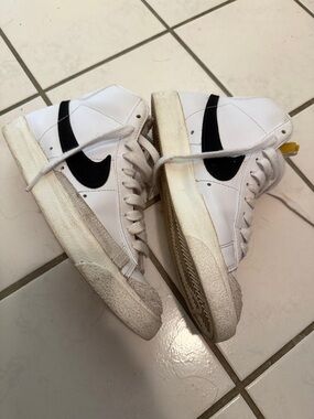 Nike White High-Top Sneakers with Black Swoosh Accent